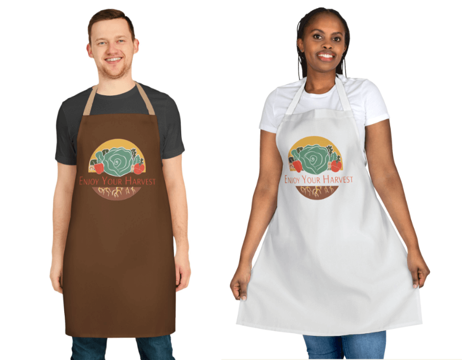 two models wearing the brown and white "Enjoy Your Harvest" aprons